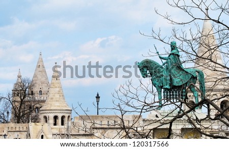 Tower of Fishermen\'s Bastion and the monument to the first king of Hungary Istvan in Budapest