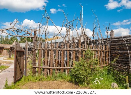 Wooden fence and gate in the village