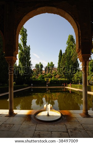 The pool in front of the Tower of the women, Alhambra, Granada, Spain