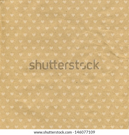 Brown paper texture with small hearts. Abstract textured background