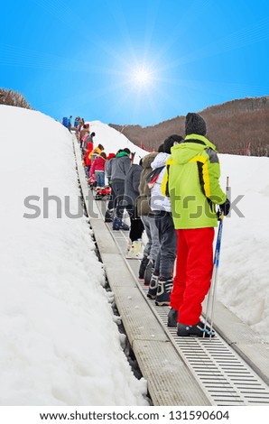 ski lift elevator snow sun sunshine family sports winter