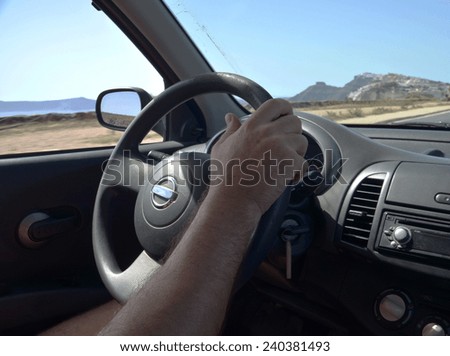 steering wheel, driver hand, island background