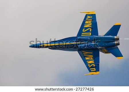 PUNTA GORDA, FLORIDA - MARCH 21: U.S. Navy Blue Angel preforms a fast flyby at 500 MPH to give the crowd a good look at the bottom of the aircraft at the Florida International Airshow on March 21-22, 2009
