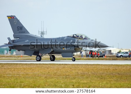 PUNTA GORDA, FLORIDA - MAR 21: An F-16 Fighting Falcon taxis down the runway during the Florida International Airshow on March 21-22, 2009