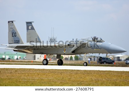PUNTA GORDA, FLORIDA - MARCH 21: An F-15 Strike Eagle taxis down the runway to take off for the Florida International Airshow held at Punta Gorda, Florida on March 21-22, 2009