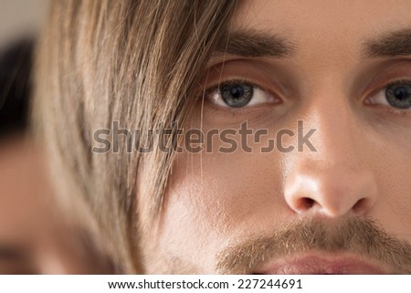 The man\'s eyes. Emotion man. Face close up. Different expressions of the face of a young man.