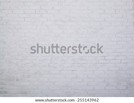 Brick Background. The texture of the brick wall of white color. Brick wall of the room is painted with white paint. Image for the background.