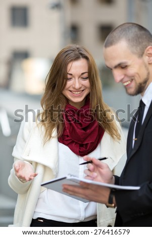 Business woman talks on the signing of the contract. Modern business partners having meeting. Business people. Business meeting. Meet the client. Business communication. Woman the focus of attention.