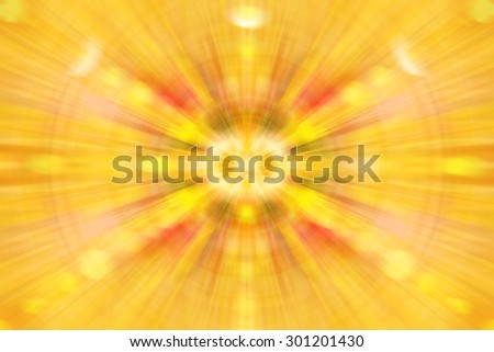 Autumn Blurred background image. Abstract image. Beauty of nature. Bright red, yellow, green, orange. Substrate, texts about sun, summer, nature, fall. Blur radially effect. Energy, yoga, meditation.