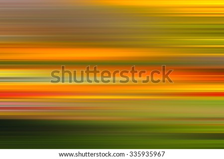 Colors background. green, red, orange, yellow. Blur abstract image. Blurring background. Blurred light. Variety of color. Background for motivational text. Motion blur. Autumn colors.
