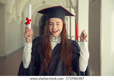 Very happy woman on her graduation day University. Woman student in graduation cap with certificate. Education and people.