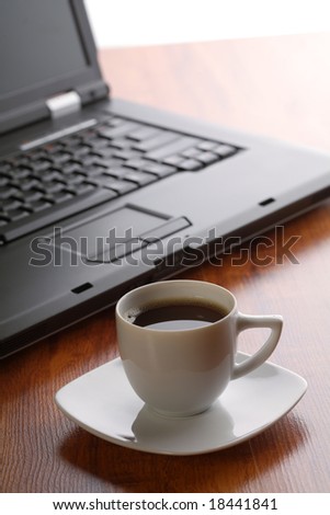 Business theme with laptop and coffee