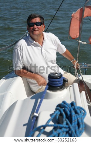 middle-aged sailor on boat