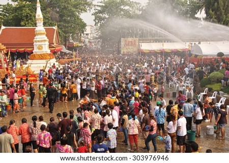NONGKHAI THAILAND APRIL 13:: Songkran Festival, People come to bathing the statue of Luang Pho Phra Sai With respect to faith. on April 13, 2015 at Wat Pochai Temple, Nong Khai Province, Thailand