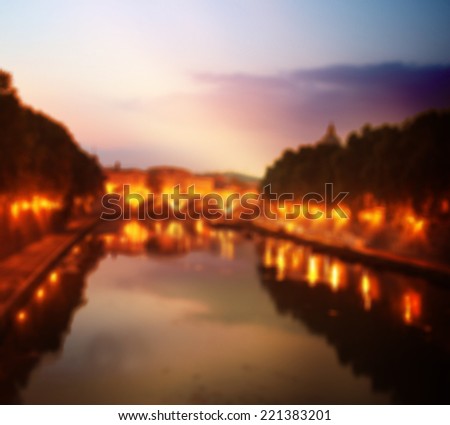 Out-of-focus shimmering city background of Paris, France