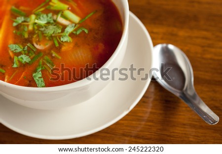Traditional Thai Tom Yam soup on the table