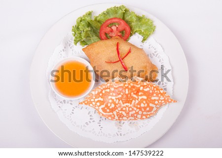 Deep-fried crab meat and minced pork Thai food on white plate