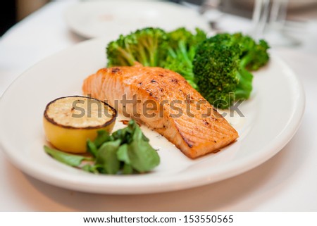 Salmon steak fillet with broccoli and lemon