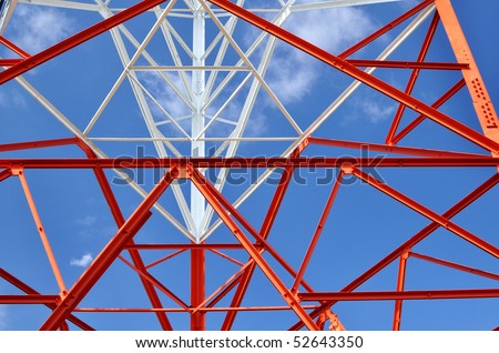 radio antenna tower structure against blue sky- horizontal