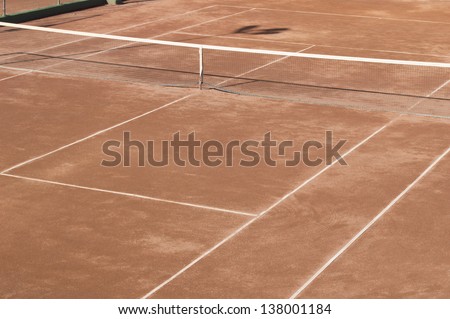 Clay surface tennis court. Dirt surface tennis court