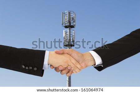 handshake to close a deal telecommunications