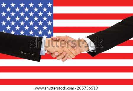 handshake of a woman and business men in USA