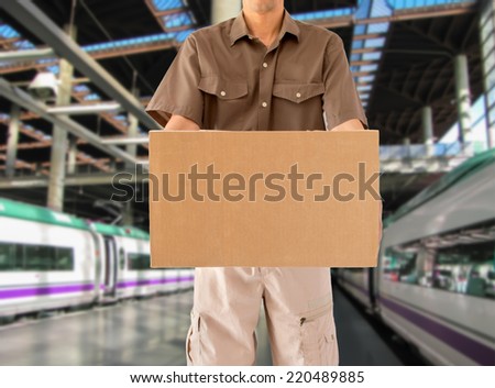 Man offering his goods transportation service from walk from a train station