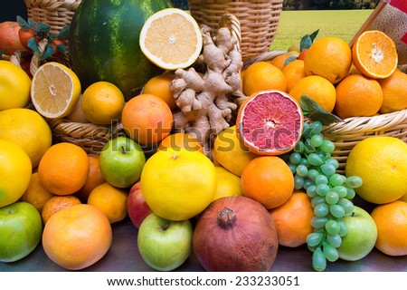 Assortment of exotic fruits isolated on field