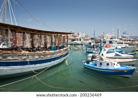 Seashells shop boat in the harbour of Rhodes, Dodecanese, Greece