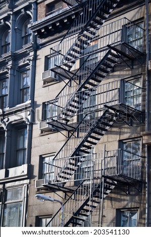 Outside metal fire escape stairs, New York City, USA