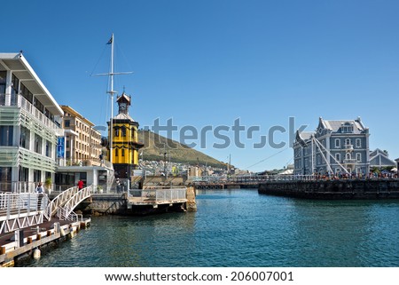 CAPE TOWN, SOUTH AFRICA - APRIL 18: Victoria Waterfront, harbor with recreation boats, shops, restaurants at April 18, 2014 in Cape Town, South Africa.