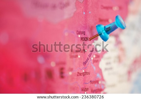 Close up on an Asia map with a pin on Beijing, China