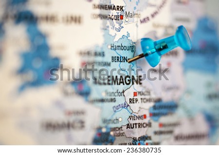 Close up on a Europe map with a pin on Berlin, Germany