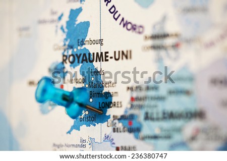 Close up on a Europe map with a pin on London, UK