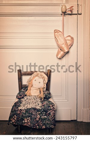 Old rag doll and pointe dance shoes, vintage process