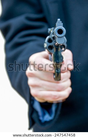 Close up of a pistol gun in the hand of a man