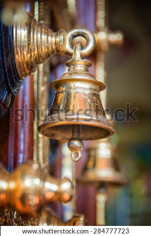 Golden bell, detail of the door of Sri Veeramakaliamman Temple in Little India