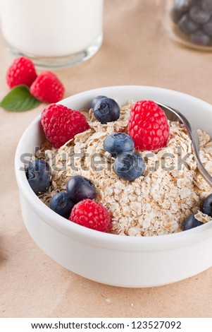 Bowl full of cereals with berries