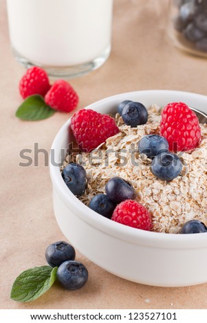 Cereals with berries in bowl