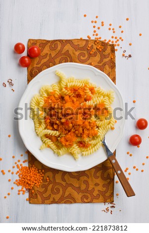 Healthy vegetarian pasta cooked with lentils and pumpkin sauce