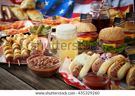 American  Picnic Table  with burgers and hot dogs for holiday 4th of July