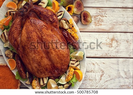 Thanksgiving Turkey dinner on white wooden table with copy space