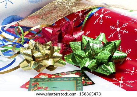 Christmas gift wrapping paper, bows and ribbons