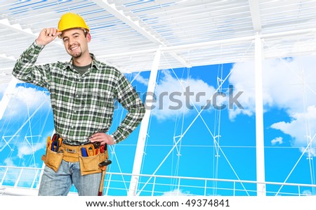 confident manual worker and modern building background