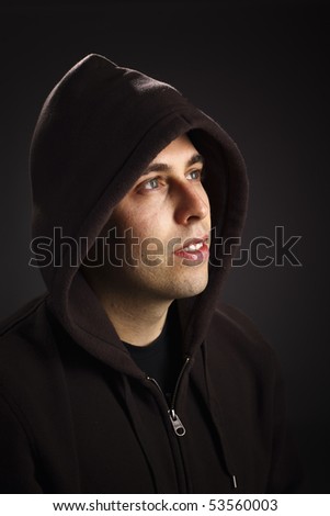 fashion young caucasian  male portrait on dark background