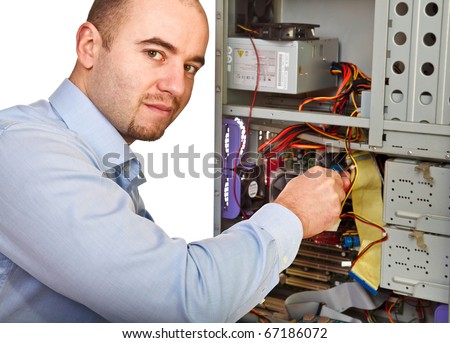 young worker on duty repair pc
