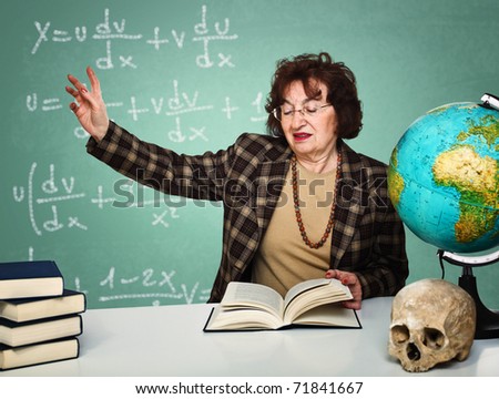 caucasian old teacher take lesson with classic board background