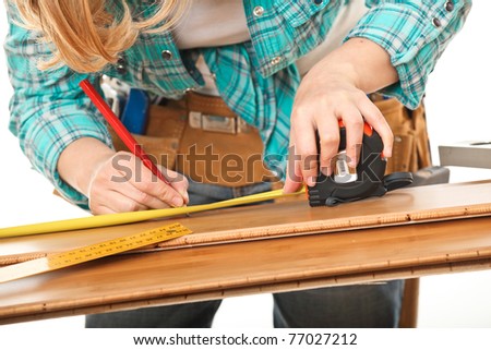 detail of woman carpenter on duty