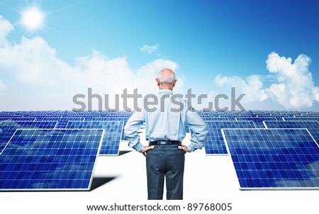 old man look solar power station
