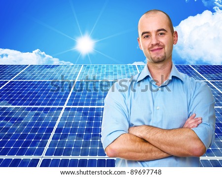 confident man and power solar station